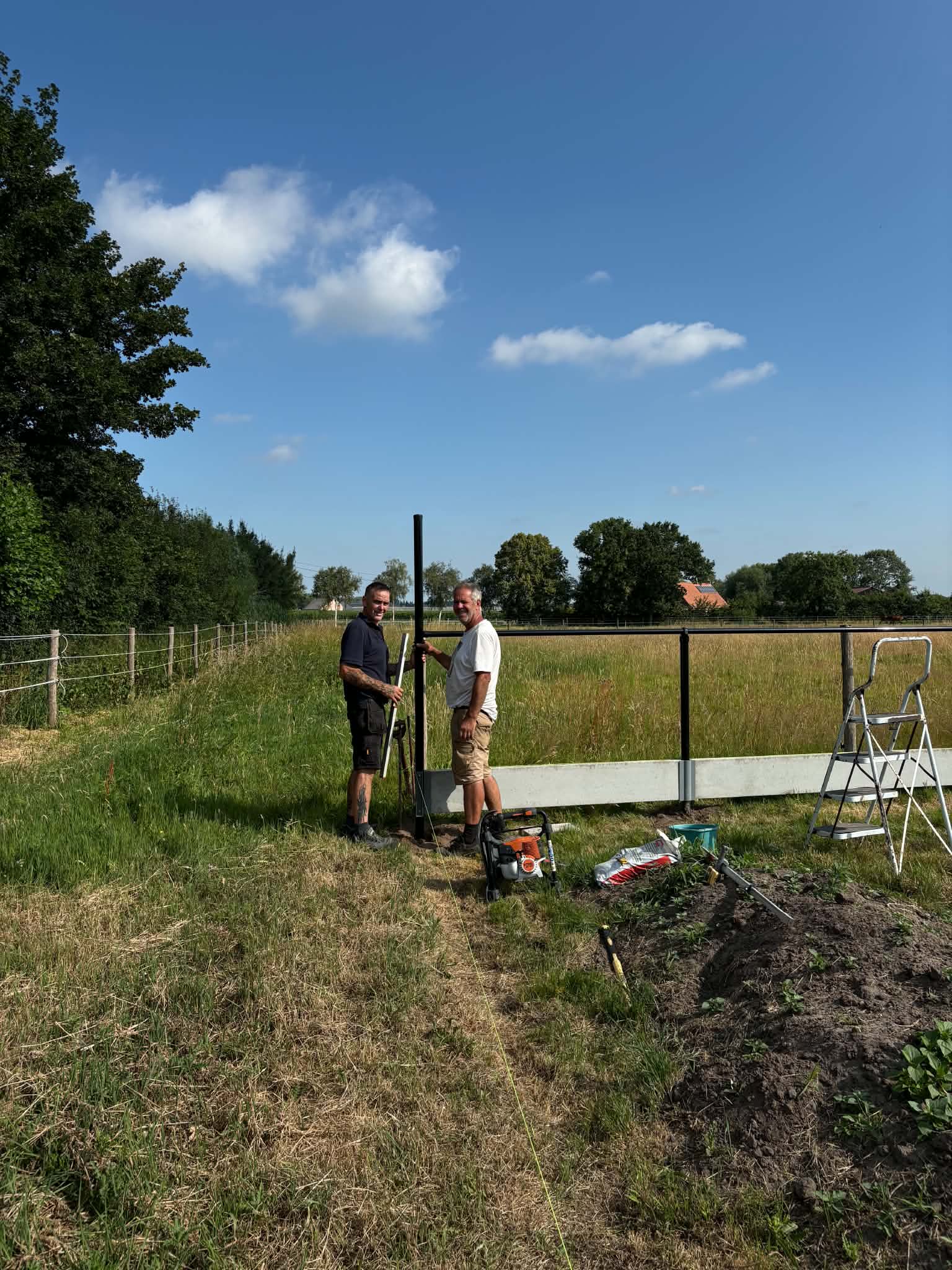 Johnny Watty en Michael Cappelle samen aan het werk bij een afsluitingsproject